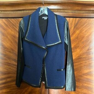 Vince navy blazer with leather sleeves.